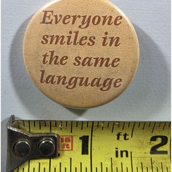 Everyone Smiles In The Same Language Pinback Button 1.5" Vintage Style Metal - Picture 3 of 3